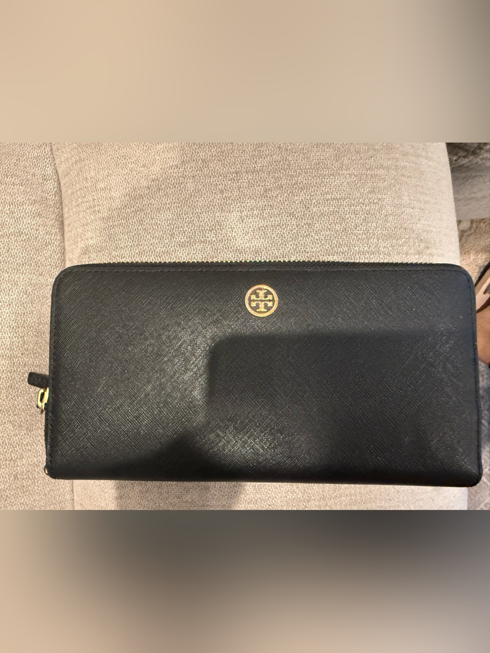 Tory Burch Black Leather Wallet- Used Condition.Slight patches of ripped leather